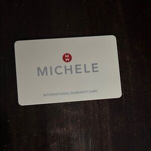 Michele Warranty Card with Red and Gray Accents